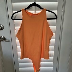 ReoRia Orange Asymmetrical Cut Out Bodysuit